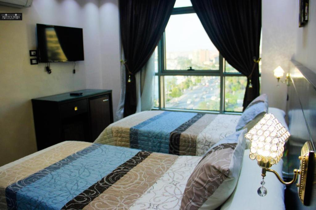 Aswan Plaza - Share Apartment Esterno foto